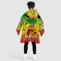 Menelik II Kid Wearable Blanket Hoodie with Crowned Portrait, Ethiopia Never Colonized Text and Pan-African Abstract - Wonder Print Shop