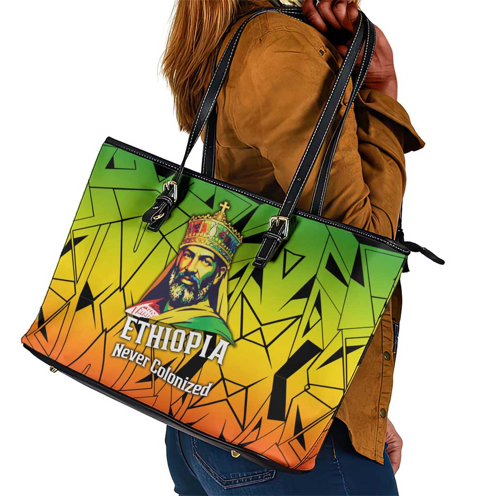Menelik II Leather Tote Bag with Crowned Portrait, Ethiopia Never Colonized Text and Pan-African Abstract - Wonder Print Shop