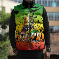 Menelik II Sleeveless Puffer Jacket with Crowned Portrait, Ethiopia Never Colonized Text and Pan-African Abstract - Wonder Print Shop