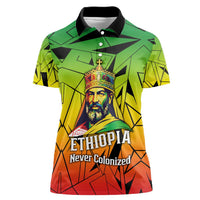 Menelik II Women Polo Shirt with Crowned Portrait, Ethiopia Never Colonized Text and Pan-African Abstract - Wonder Print Shop