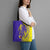 Campione d’Italia Tote Bag with Yellow Horse Graphic and Purple Flame Crest - Wonder Print Shop