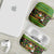 Jamaica Christmas AirPods Case with Rasta Santa Snowman Gingerbread Drummer Palm Trees and Green Yellow Knit Pattern Design - Wonder Print Shop