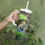 Personalized Bass Fishing Design Tumbler With Handle Leaping Fish Graphic and Camouflage Green Water Splash Print - Wonder Print Shop