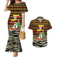 Uganda Christmas Couples Matching Mermaid Dress and Hawaiian Shirt with Santa in Canoe Christmas Tree Uganda Map Flag and Black Red Yellow Tribal Pattern Design - Wonder Print Shop