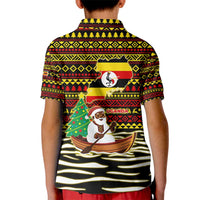 Uganda Christmas Kid Polo Shirt with Santa in Canoe Christmas Tree Uganda Map Flag and Black Red Yellow Tribal Pattern Design - Wonder Print Shop