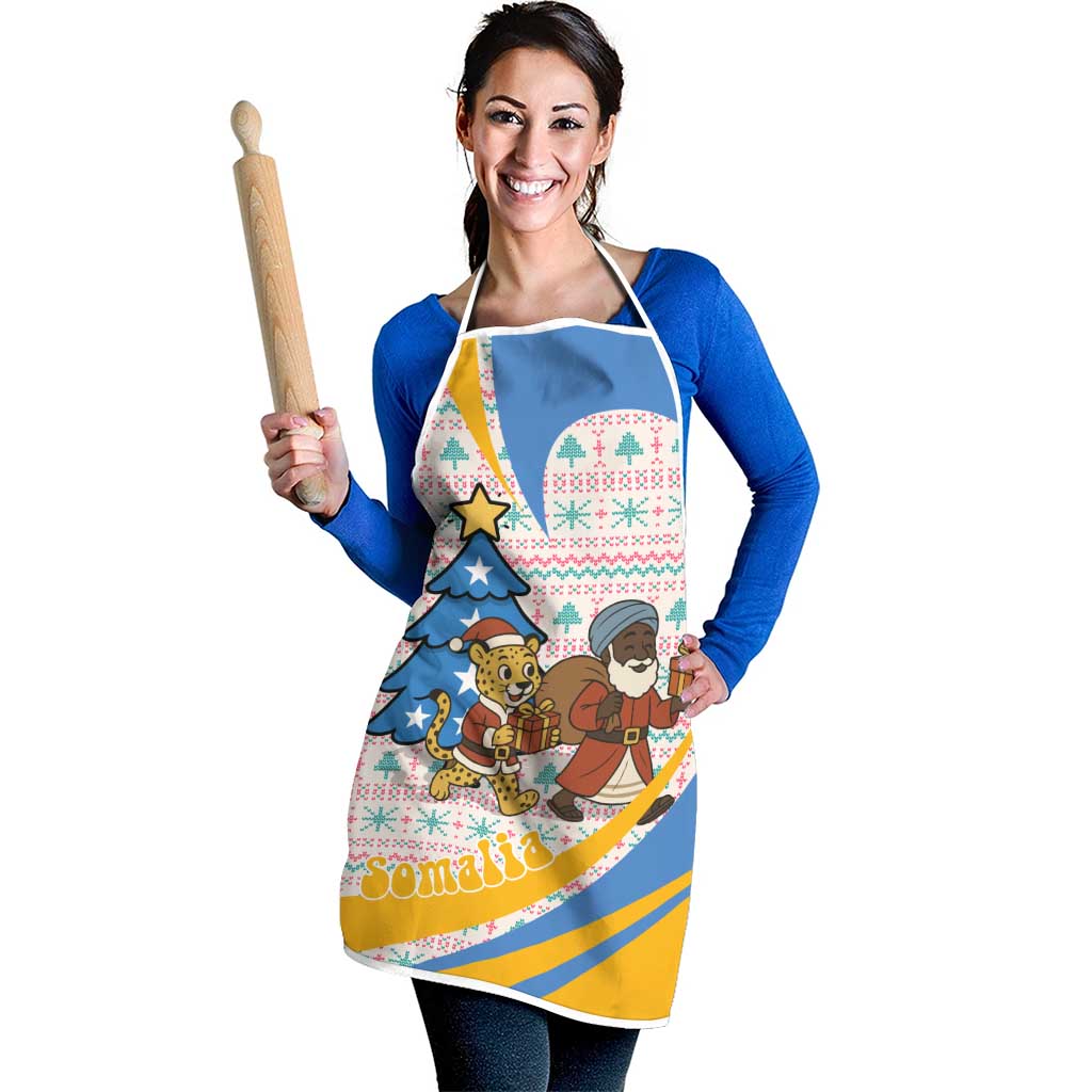 Somalia Christmas Apron with Santa Cheetah Christmas Tree Village Scene and Festive Snowflake - Wonder Print Shop