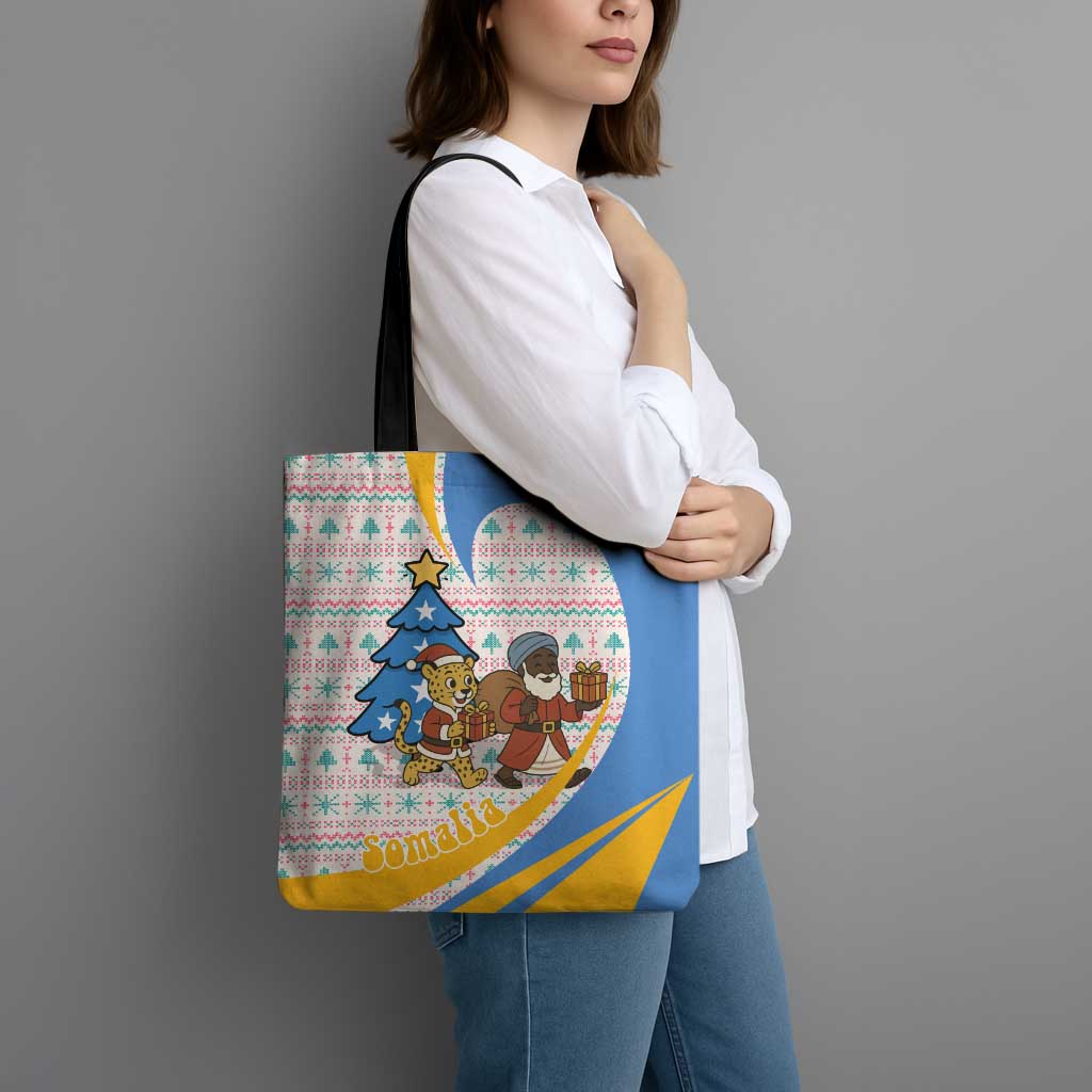 Somalia Christmas Tote Bag with Santa Cheetah Christmas Tree Village Scene and Festive Snowflake - Wonder Print Shop