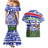 Gambia Christmas Couples Matching Mermaid Dress and Hawaiian Shirt with Santa Birds Gift Boxes Forest Scene and Snowflake Pattern Design - Wonder Print Shop