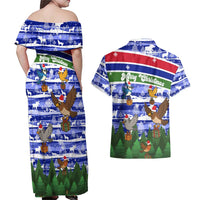 Gambia Christmas Couples Matching Off Shoulder Maxi Dress and Hawaiian Shirt with Santa Birds Gift Boxes Forest Scene and Snowflake Pattern Design - Wonder Print Shop
