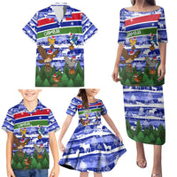 Gambia Christmas Family Matching Puletasi and Hawaiian Shirt with Santa Birds Gift Boxes Forest Scene and Snowflake Pattern Design - Wonder Print Shop