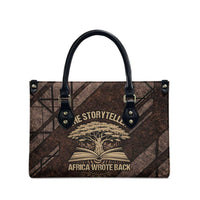 Chinua Achebe Leather Bag with Tribal Symbol Design, The Storyteller Quote and Africa Wrote Back - Wonder Print Shop