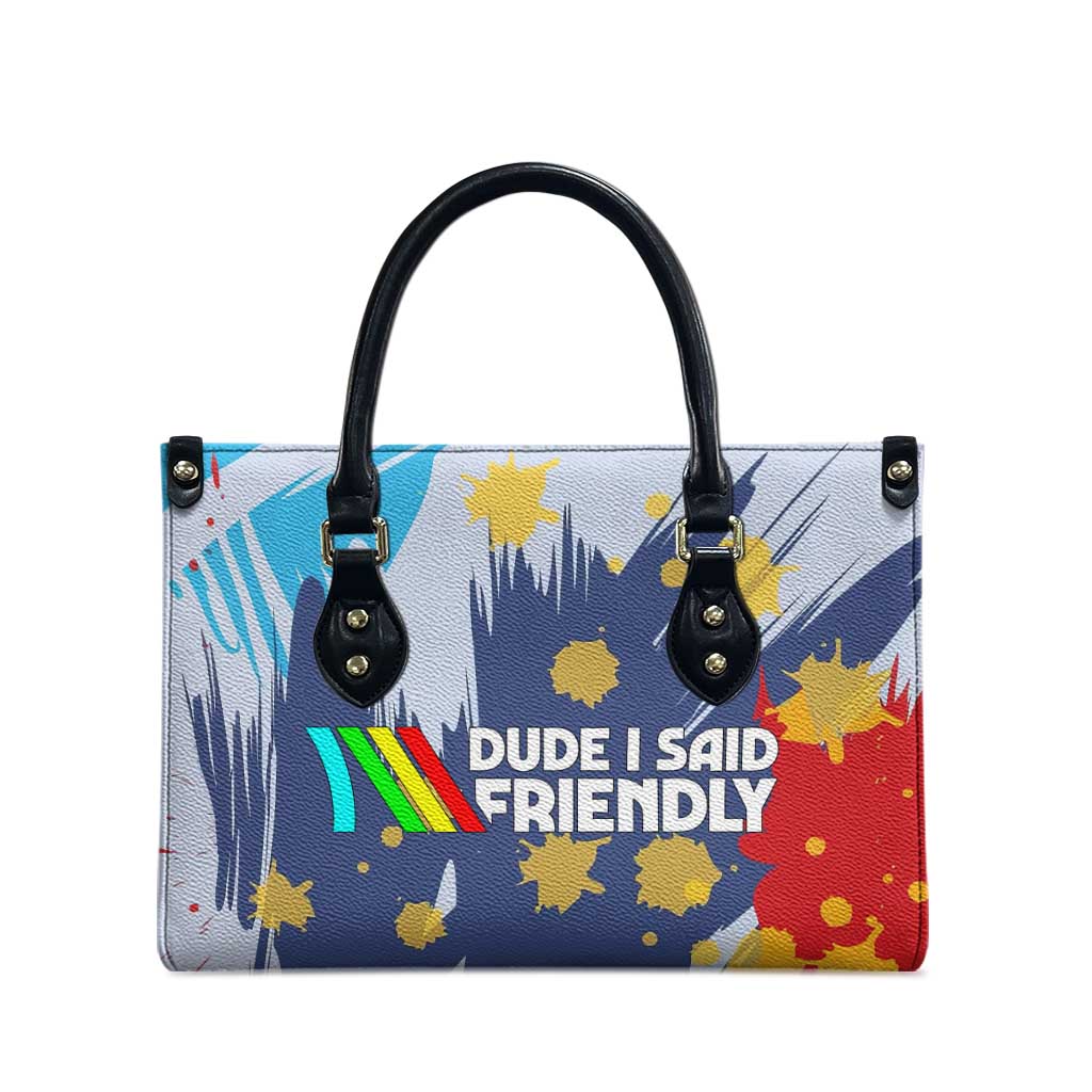 Dude I Said Friendly Graphic Leather Bag with Gold Paint Splatter and Retro Stripes