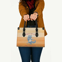First Of All Raccoon Humor Leather Bag with Vintage Orange Stripes