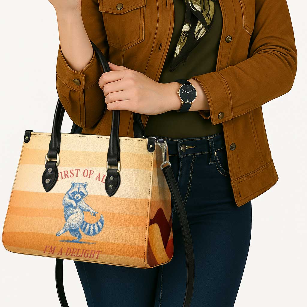 First Of All Raccoon Humor Leather Bag with Vintage Orange Stripes