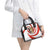 Bahrain Tribal Camel Shoulder Handbag with Red Mosaic Swirl and Heritage Slogan