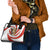 Bahrain Tribal Camel Shoulder Handbag with Red Mosaic Swirl and Heritage Slogan