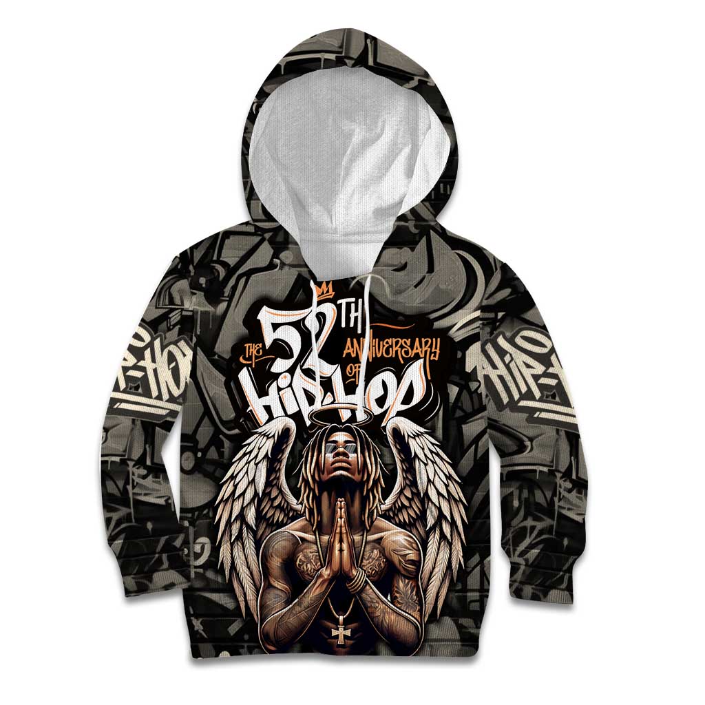 52th Anniversary Of Hiphop Celebration Kid Hoodie with Praying Angel Graphic and Urban Graffiti Background - Wonder Print Shop