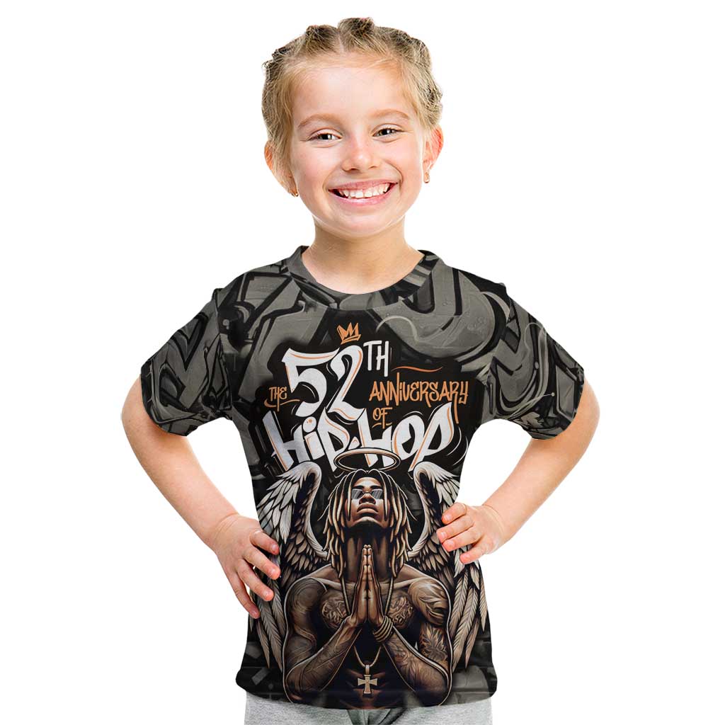 52th Anniversary Of Hiphop Celebration Kid T Shirt with Praying Angel Graphic and Urban Graffiti Background - Wonder Print Shop