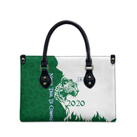 Indigenous Regions of Panama Naso Tjer Di Comarca Leather Bag with Jaguar Graphic and Green White Territory and Life 2020 - Wonder Print Shop