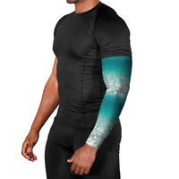 Striped Bass Fishing Arm Sleeves with Underwater Ocean Scene and Teal Water Pattern - Wonder Print Shop