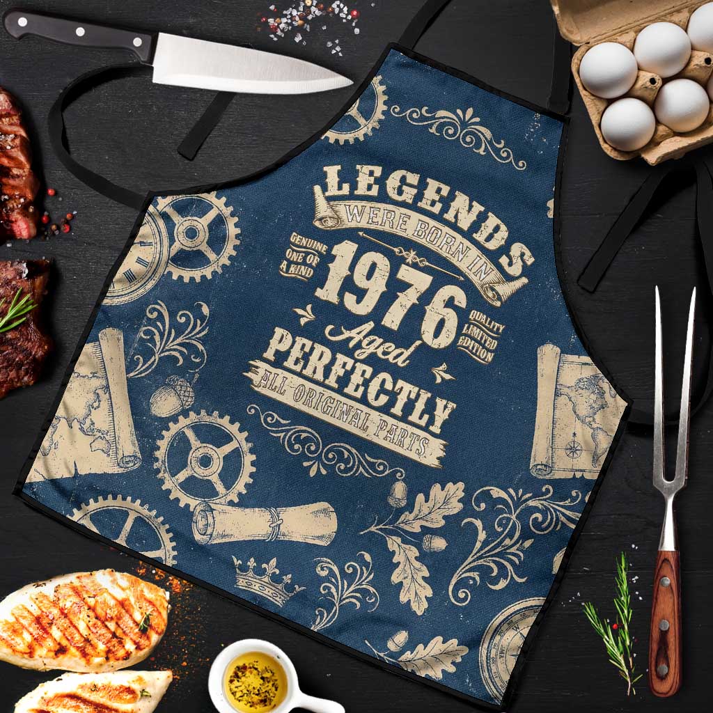 Legend 1976 Vintage Gears and Scrolls Design Apron with Crown Motif in Classic Blue and Beige Retro