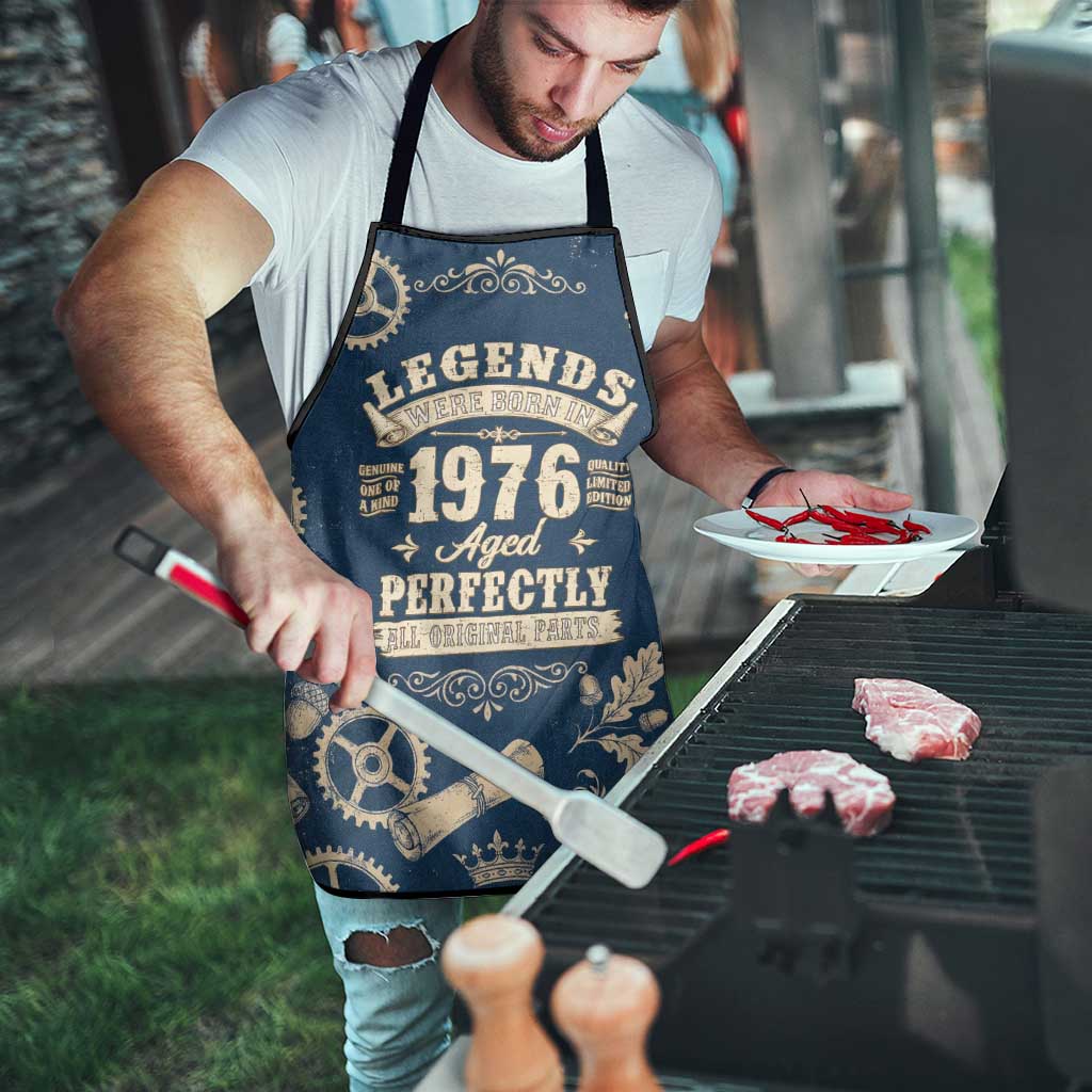Legend 1976 Vintage Gears and Scrolls Design Apron with Crown Motif in Classic Blue and Beige Retro
