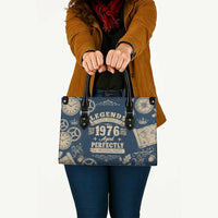 Legend 1976 Vintage Gears and Scrolls Design Leather Bag with Crown Motif in Classic Blue and Beige Retro