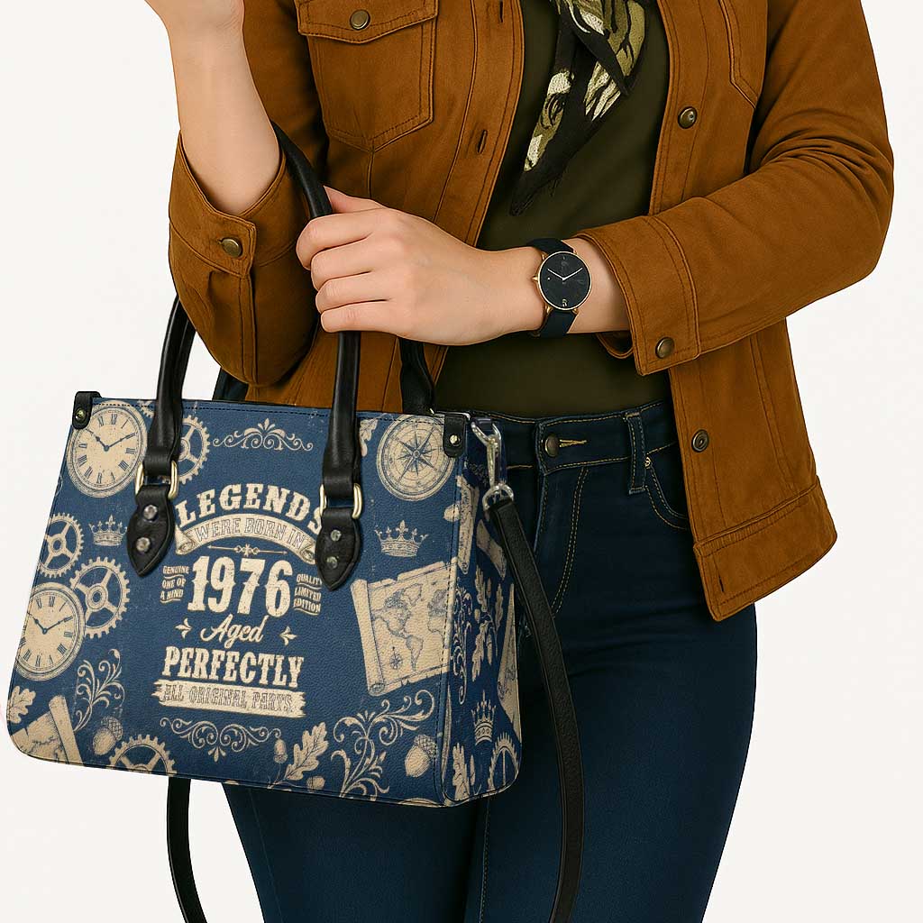 Legend 1976 Vintage Gears and Scrolls Design Leather Bag with Crown Motif in Classic Blue and Beige Retro