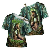 Brr Brr Patapim Cross Shoulder Shirt Glowing Heart and Magical Tree Roots in Enchanted Woods