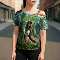 Brr Brr Patapim Cross Shoulder Shirt Glowing Heart and Magical Tree Roots in Enchanted Woods