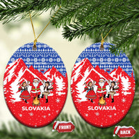 Slovakia Christmas Ceramic Ornament with Santa and Dancers by Campfire Snowy Mountains and Red Blue Snowflake Pattern Design - Wonder Print Shop