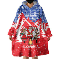 Slovakia Christmas Wearable Blanket Hoodie with Santa and Dancers by Campfire Snowy Mountains and Red Blue Snowflake Pattern Design - Wonder Print Shop