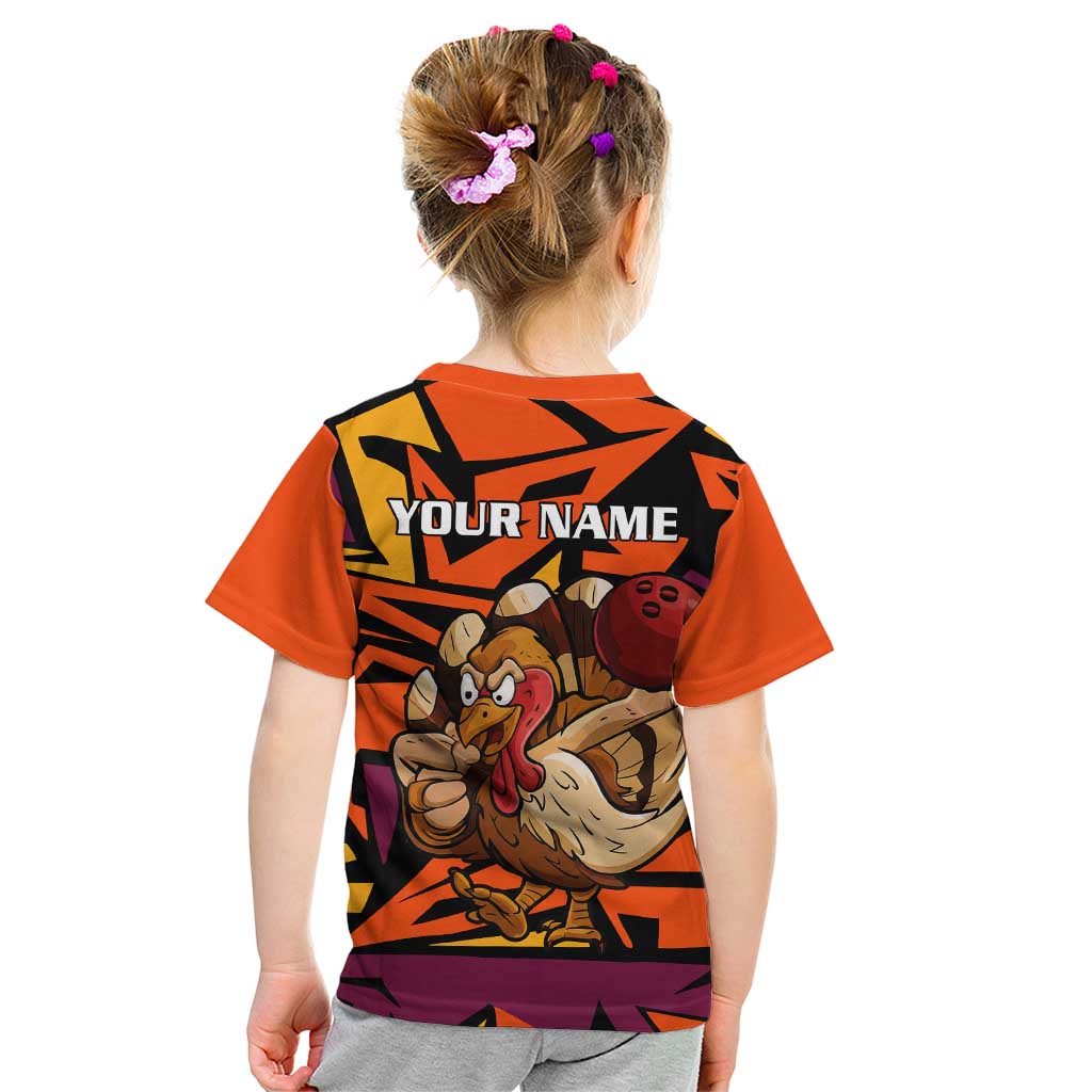 Custom Turkey Bowling Kid T Shirt with Cartoon Turkey Striker and Orange Geometric Pattern - Wonder Print Shop