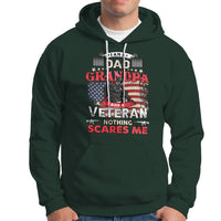 Dark forest green pullover hoodie with front veteran graphic and Nothing Scares Me text