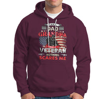 Maroon pullover hoodie with front veteran graphic and Nothing Scares Me text