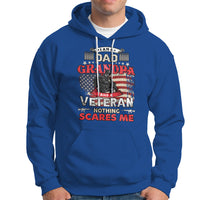 Royal blue pullover hoodie with front veteran graphic and Nothing Scares Me text