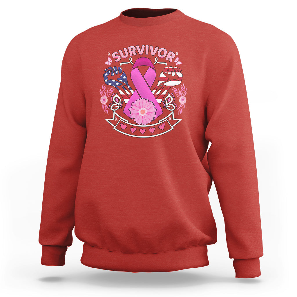 Red breast cancer awareness sweatshirt with 'survivor' graphic and pink ribbon