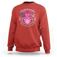 Red breast cancer awareness sweatshirt with 'survivor' graphic and pink ribbon