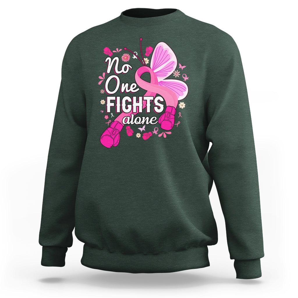 Dark forest green breast cancer awareness sweatshirt with pink ribbon butterfly “No One Fights alone”.