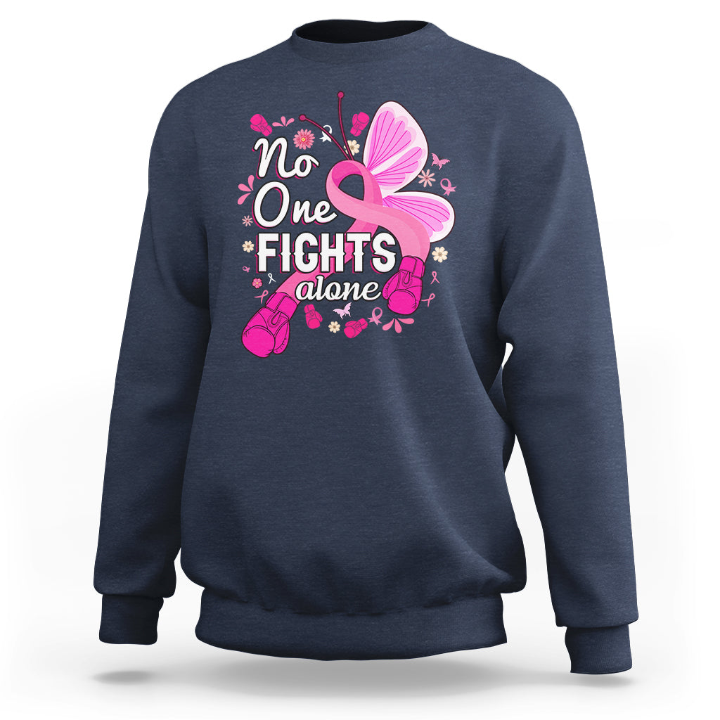 Navy breast cancer awareness sweatshirt with pink ribbon butterfly “No One Fights alone”.
