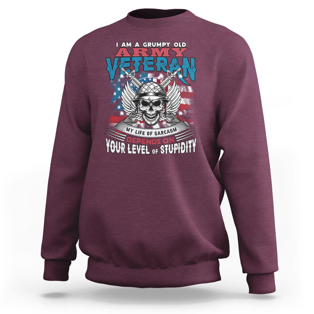 Maroon crewneck sweatshirt with front veteran graphic and skull, long sleeves