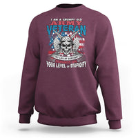 Maroon crewneck sweatshirt with front veteran graphic and skull, long sleeves