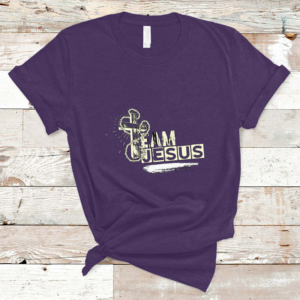 Purple T-shirt with front “Team Jesus” graphic and cross emblem