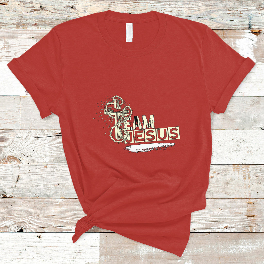 Red T-shirt with front “Team Jesus” graphic and cross emblem