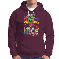 Maroon autism hoodie with front pocket and colorful “Have Autism” text graphic