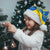 Ukraine Christmas Santa Hat with Howling Wolf Sunflower Tree and Traditional Ornament Design - Wonder Print Shop