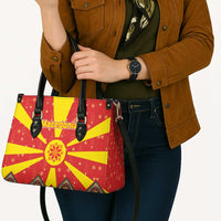 Macedonia Christmas Leather Bag with Yellow Sun, Santa, and Festive Tree Motif - Wonder Print Shop