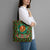 Kenya Christmas Tote Bag with Santa Feast Scene and Festive Wreath Pattern - Wonder Print Shop
