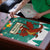 Wales Christmas Puzzle with Red Dragon Santa Sleigh and Festive Green Snowflake - Wonder Print Shop