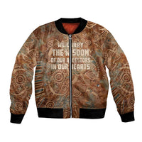 We Carry The Wisdom Bomber Jacket African Ancient Symbols, Earthy Tones, and Ancestral Wisdom Quote - Wonder Print Shop